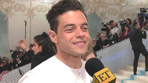 Rami Malek shares a playful moment with fans at YSL after.